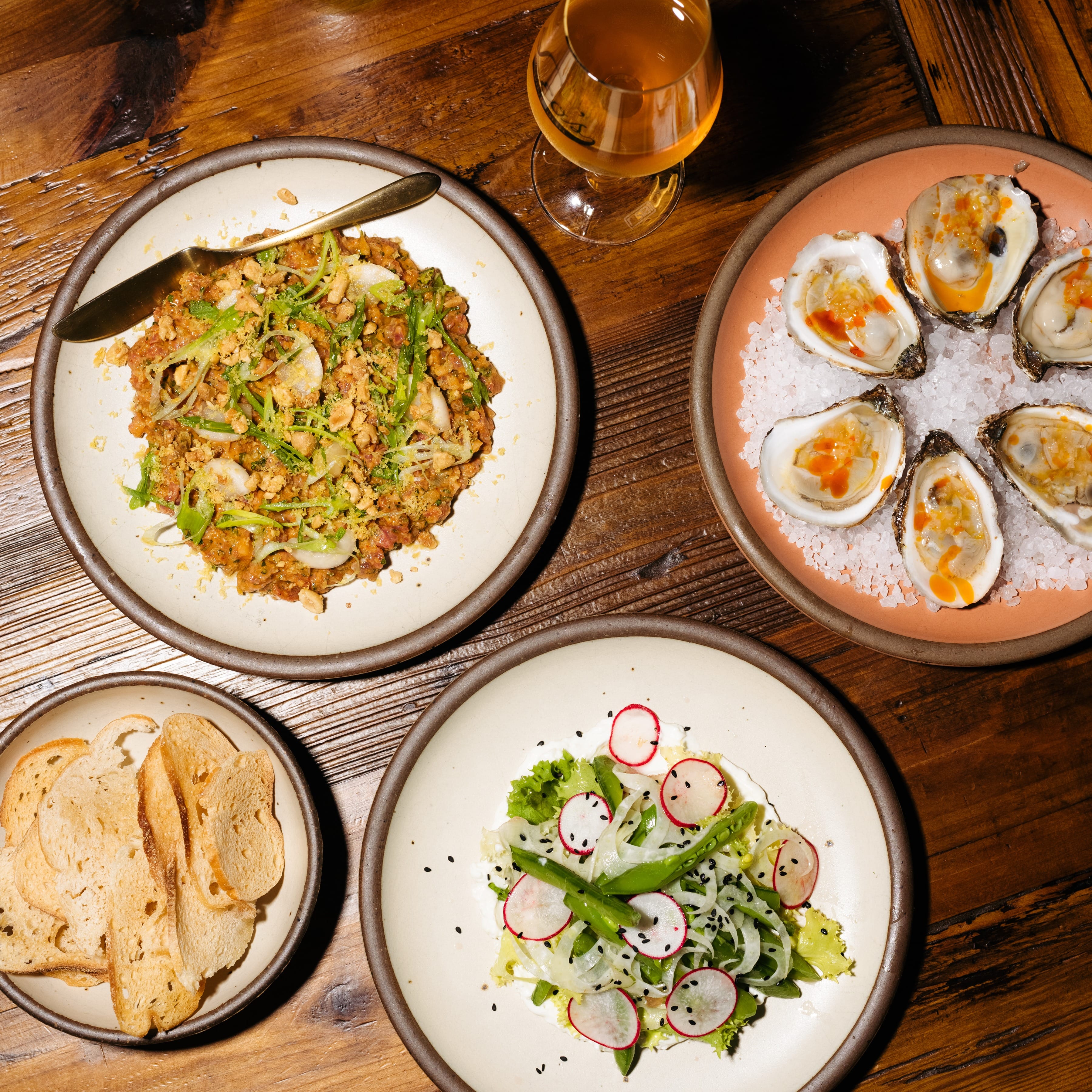 Top-down view of an assortment of food dishes on a table